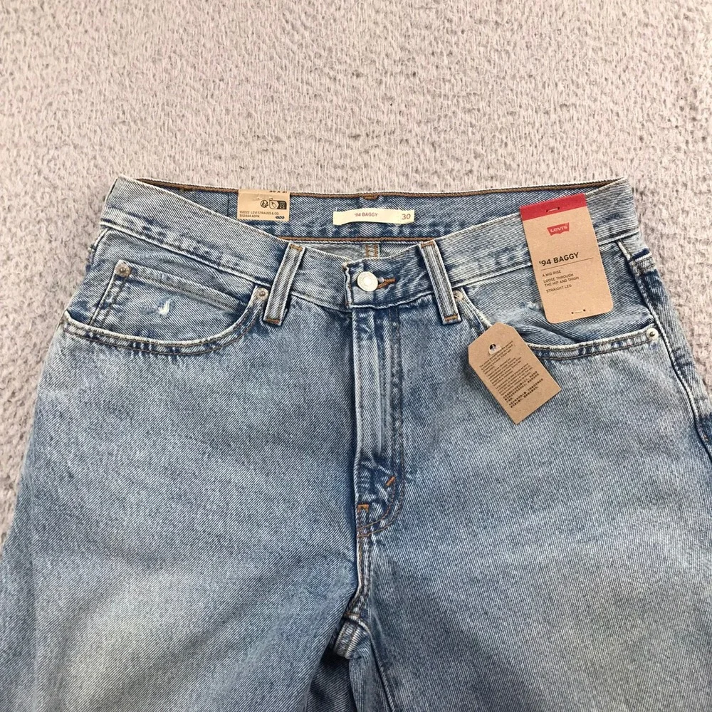 Levis 94 Baggy Jeans Women 30 Blue Distressed Knee Holes Mid Rise Straight NEW
